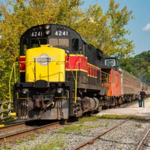 The scenic train stops to let passengers on and off at the station in Peninsula during its run on the Cuyahoga Valley Scenic Railroad