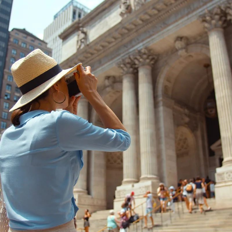 female tourist at the met museum in new york city