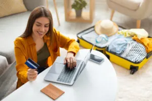 Woman Booking Travel Online