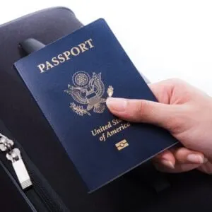A Female Hand Holding A United States Passport, American Passport, United States Traveler, American Traveler