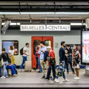 people walking in Brussels train station