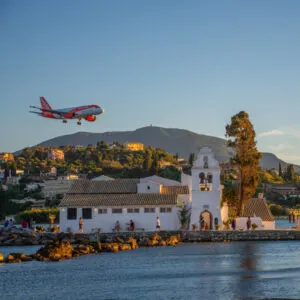 plane flying over city
