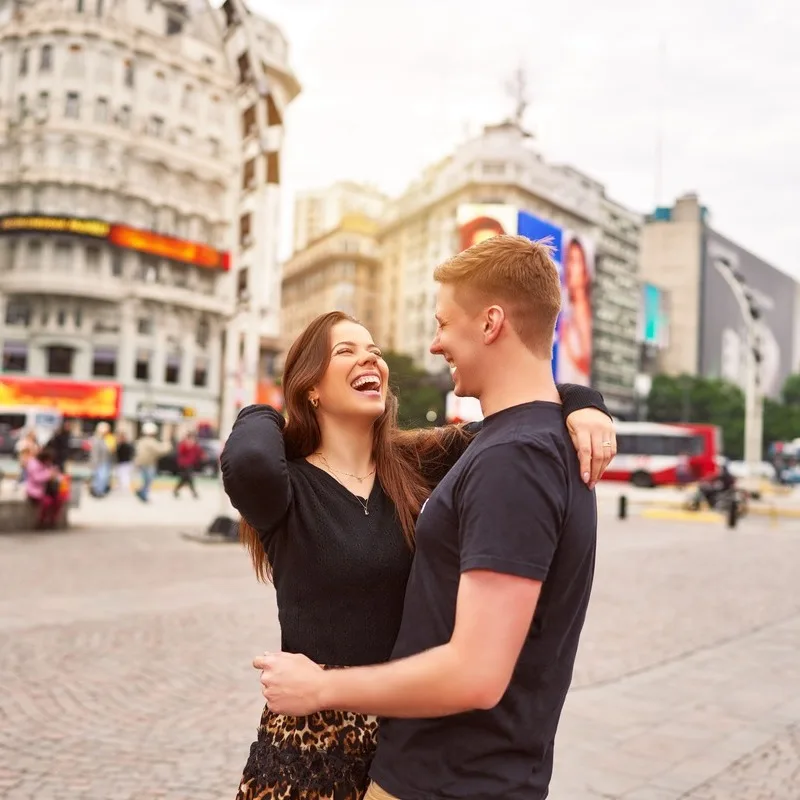 A smiling couple embracing in Central Buenos Aires, Argentina, Latin America