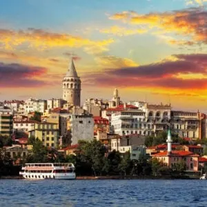 The Karakoy District Of Istanbul With The Historical Galata Tower Towering Above The Historical Buildings Across The Golden Horn, Seen At Sunset, Turkiye, Eurasia