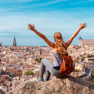 Woman tourist enjoying panoramic view of Toledo city- Castilla la Mancha, Spain