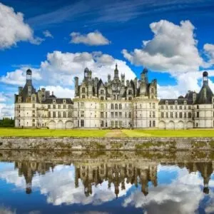 a castle reflecting on the water