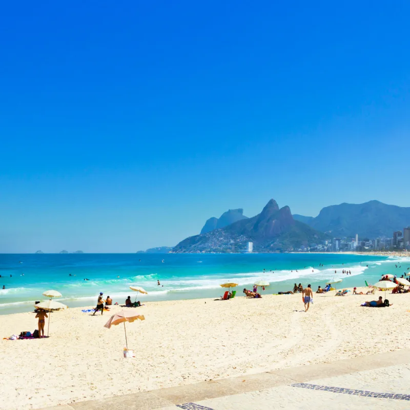 Landscape of the beaches of Ipanema and Leblon with bathers and in the background the famous hill two brothers Rio de Janeiro