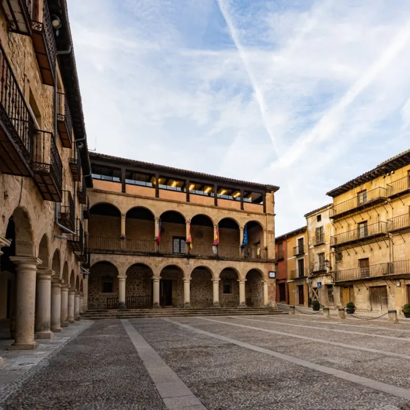 empty courtyard in Siguenza Spain with blue sky