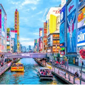 Tourists at Dotonbori shopping street, Dotonbori is the famous destination for traveling and shopping in Osaka, Japan.