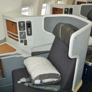 Interior view of Business class seats in the Business Class cabin of a Boeing 777-300 from American Airlines