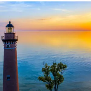 Little Sable Point Lighthouse at sunset over Lake Michigan; Mears, Michigan; Silver Lake State Park
