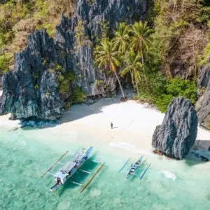a beautiful sandy bay in the region of palawin island in the philippines