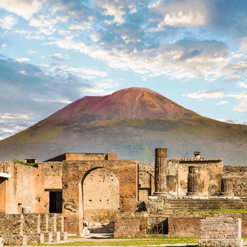 Pompeii Ruins Set Against The Backdrop Of Mount Vesuvius, Campania, Italy, Southern Europe