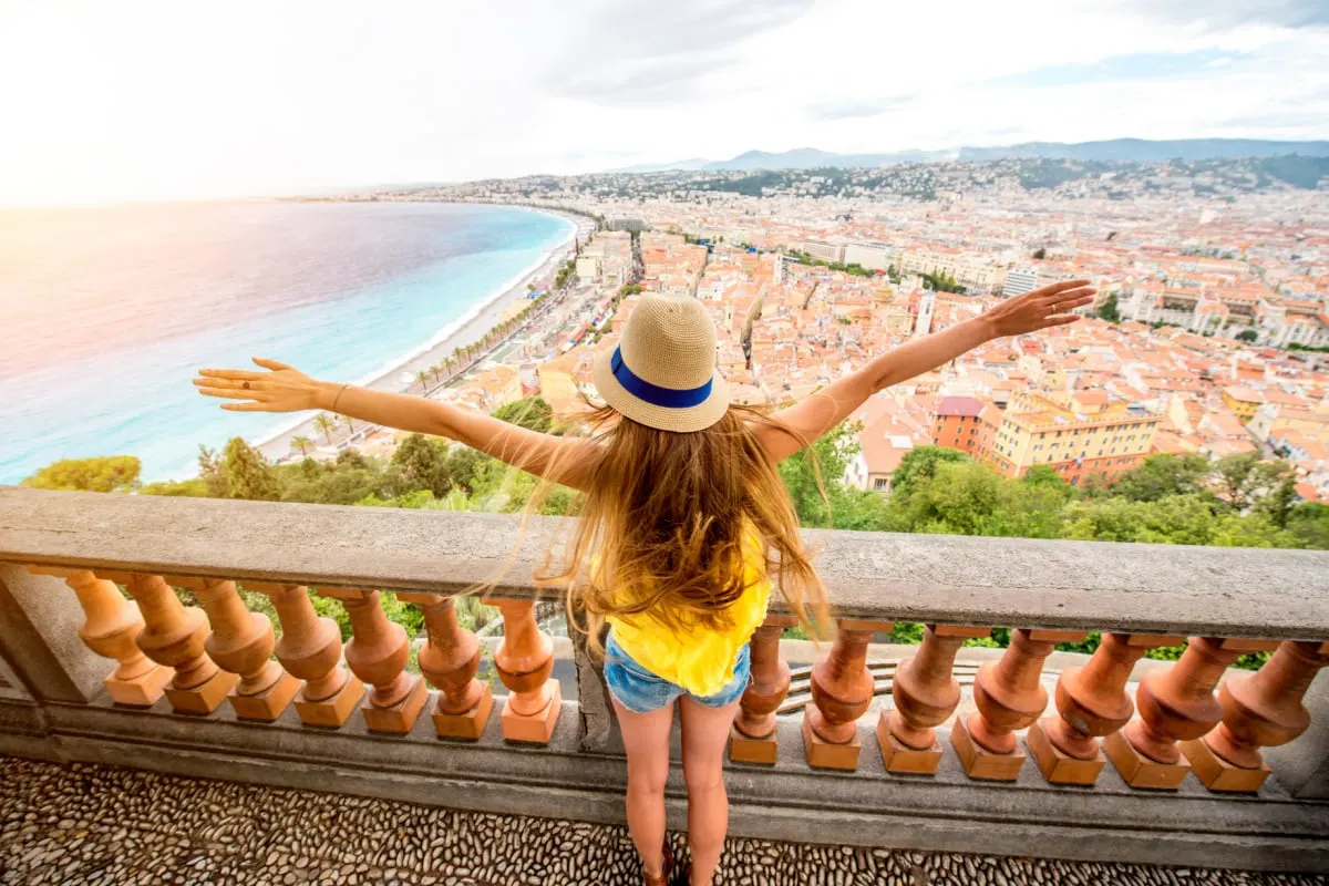 Woman overlooking a city in France