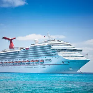 carnival cruise ship sailing off the coast of the cayman islands