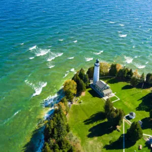 The famous Cana Island lighthouse located next to lake Michigan in Door County Wisconsin with a drone