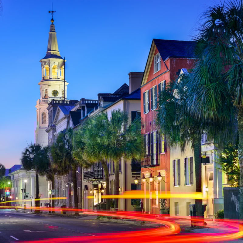 the french quarter of downtown charleston south carolina at night with light trails
