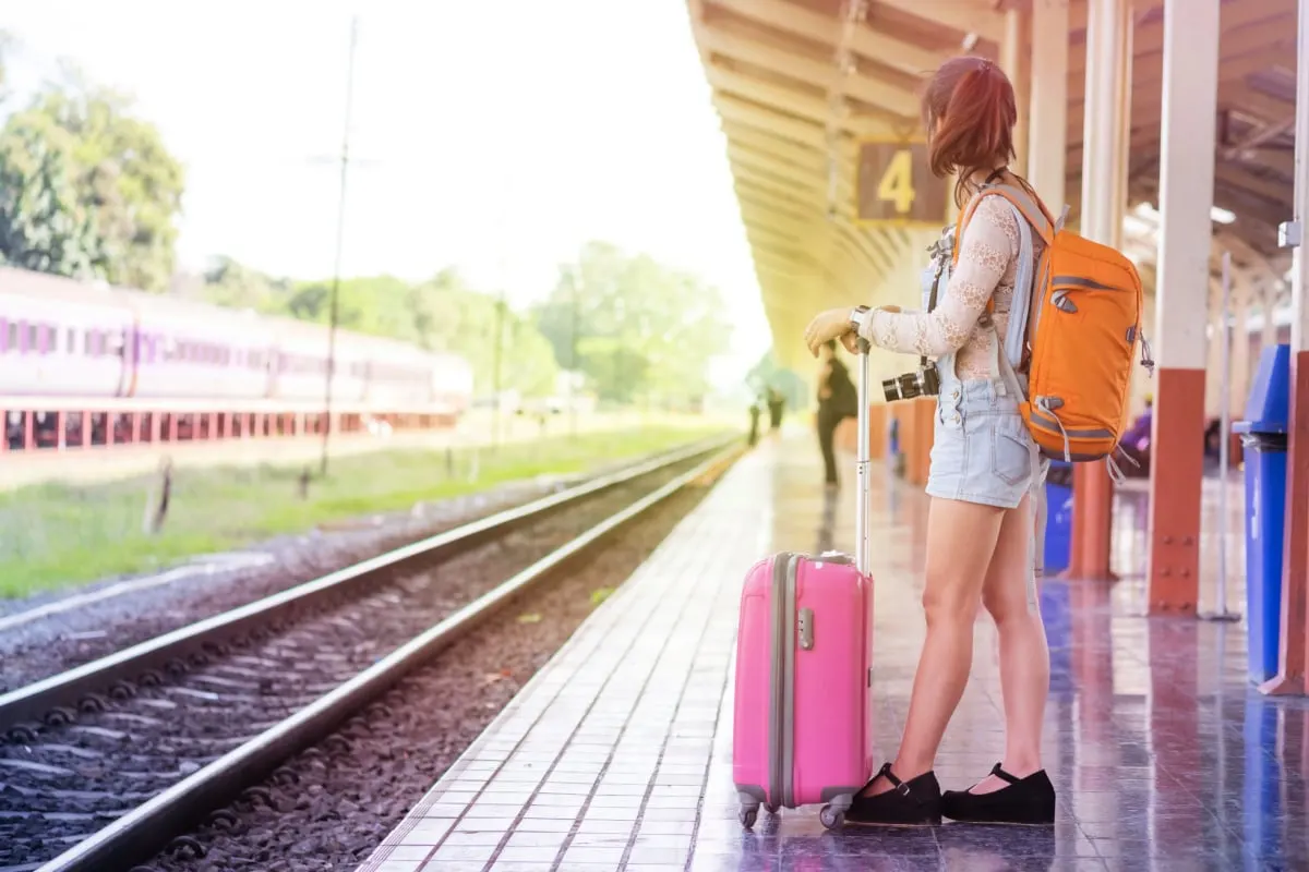 Woman waiting for a train