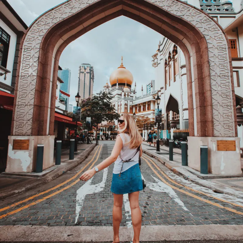 Female tourist visiting a mosque in Singapore