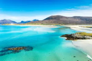 Pristine blue water and beach in Luskentyre Sands