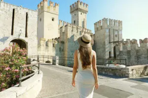 Female tourist visiting Sirmione castle