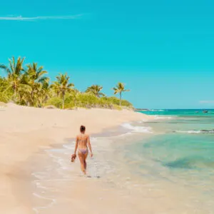 Woman walking on a beach in Bermuda