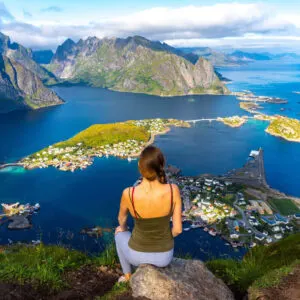 Young Woman Admiring Views Of Lofoten From A Viewpoint In Northern Norway, Scandinavia, Northern Europe.jpg