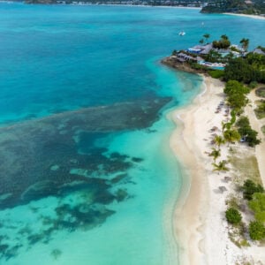 Caribbean state of Antigua and Barbuda. Surrounded by coral reefs, the island is known for its many sandy beaches.