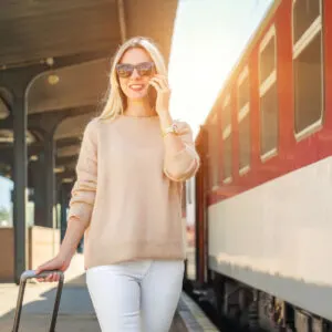 Female-travel-on-phone-boarding-train