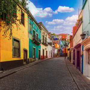 Picturesque Historic Colonial Street Lined By Colorful Houses In Guanajuato Old Town, Mexico, Latin America