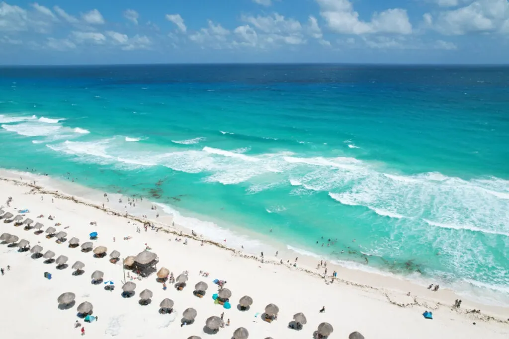 Overhead view of beach in Cancun with very little sargassum