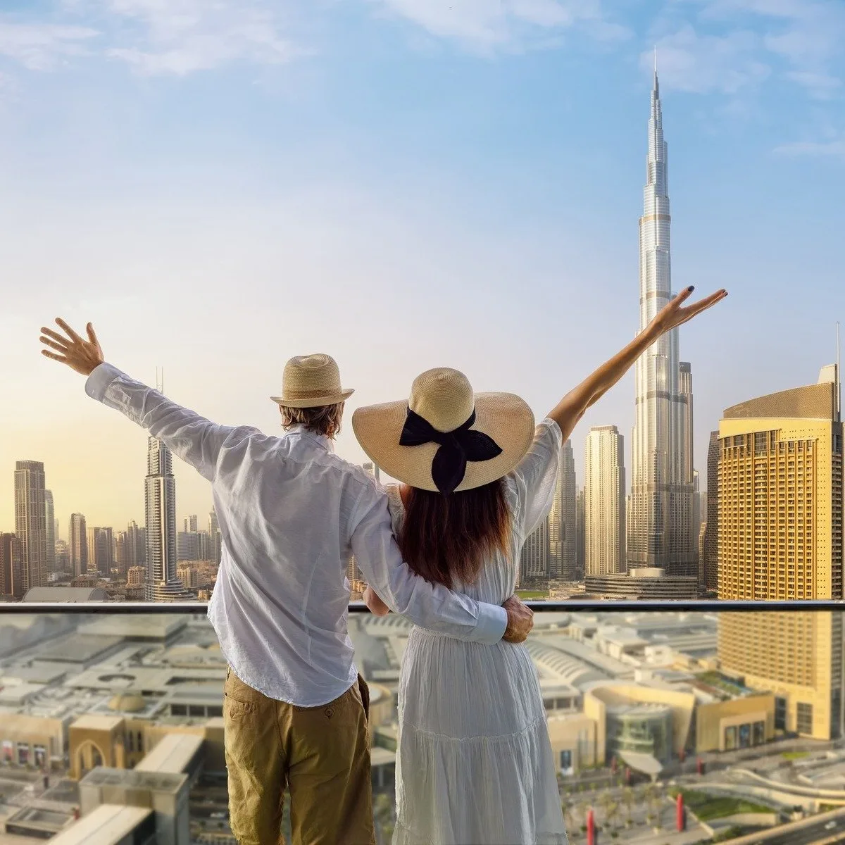 Young Couple Raising Their Arms While Taking A Picture At A Lookout In Dubai Overlooking Burj Khalifa, Dubai, United Arab Emirates, Middle East