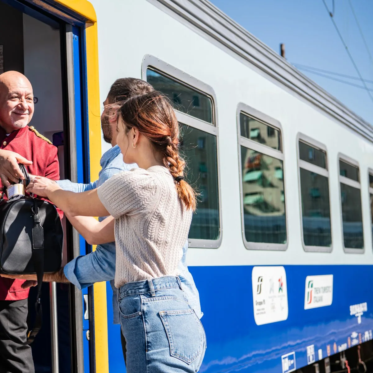 Passengers boarding the Espresso Salento train (image credit: Treni Turistici Italiani)