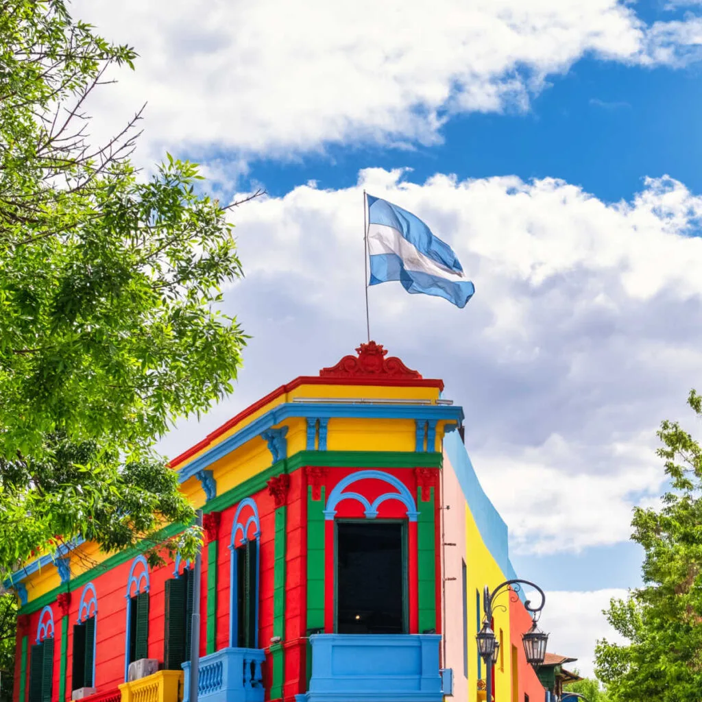 Brightly colored building with Argentina flag
