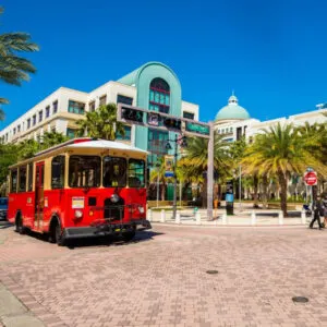 Cityscape view of the the popular West Palm Beach downtown district with City Hall along Clematis Street.