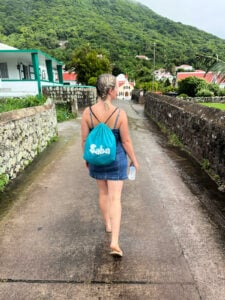 Liz Fox walking through town in Saba