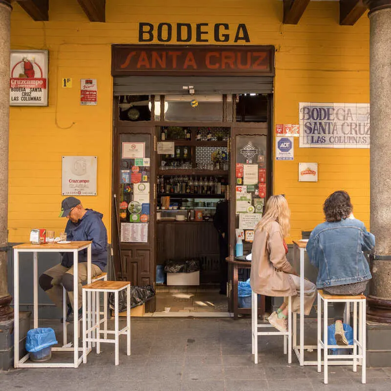 Locals Eating In A Local Bodega In Seville, Spain