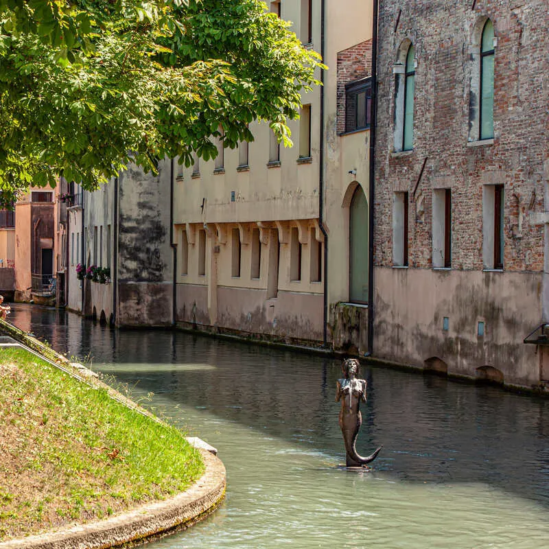 Mermaid Statue In A Canal In Treviso, Italy, Southern Europe