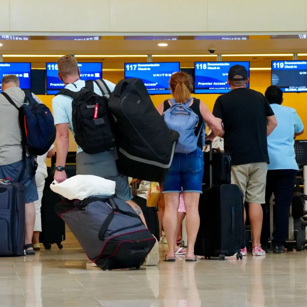Passengers queuing at Cancun airport