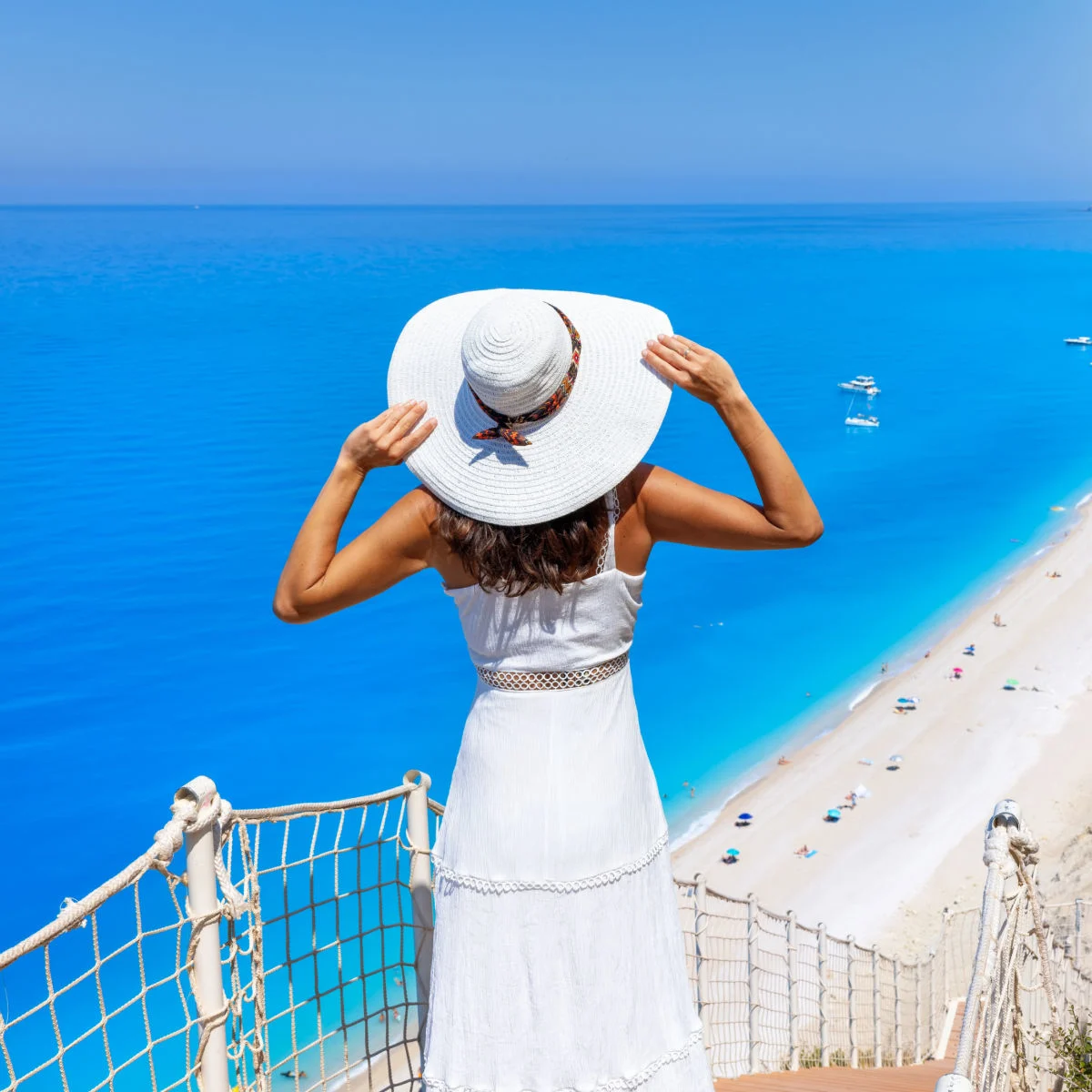 Woman overlooking Egremni Beach, Lefkada