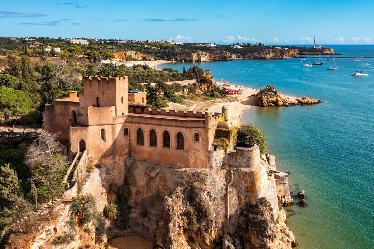 Aerial View Of Ferragudo Castle Lining The Atlantic Sea In The Algarve, Portugal