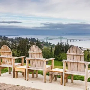 3 chairs overlooking Astoria Oregon astounding scenery