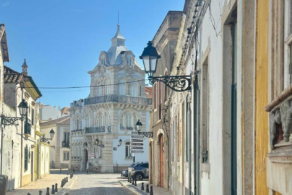 Cobbled Street Leading To Church In Faro, Portugal