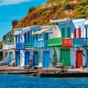 Colorful Doors On Whitewashed Harbor Houses In Klima, Milos, Greece