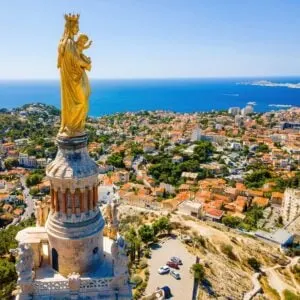 Golden Notre Dame Statue On Top Of Notre Dame de la Garde In Marseille, France