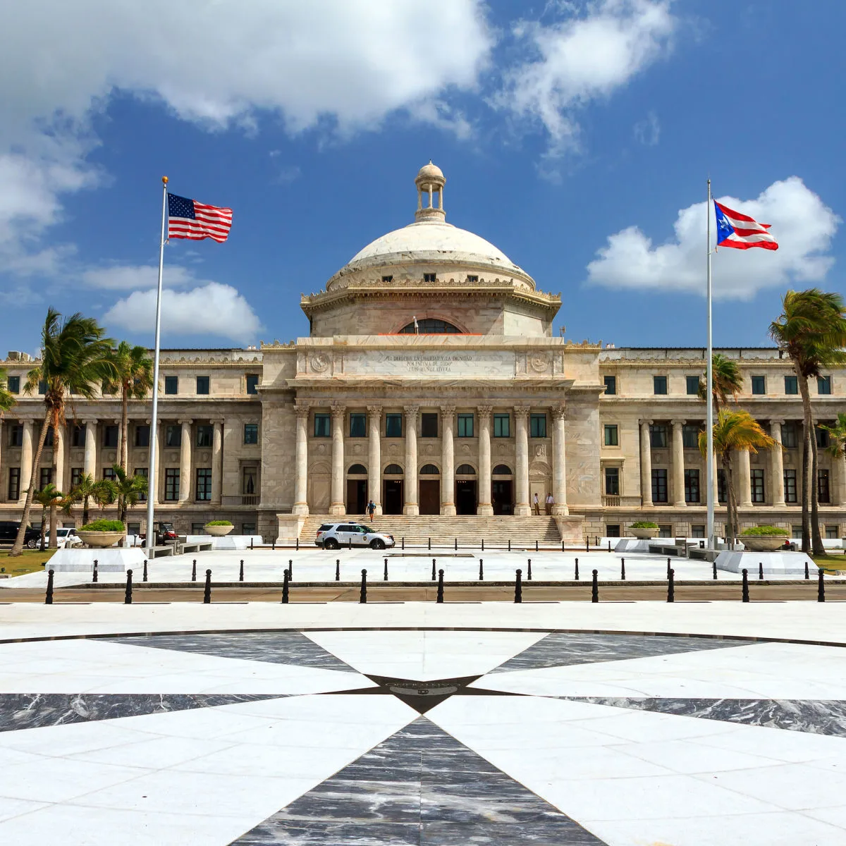 Puerto Rico Capitol with U.S. flag and Puerto Rico flag