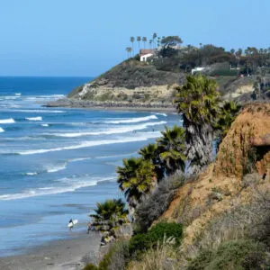 Surfer in Carlsbad CA on-nice day