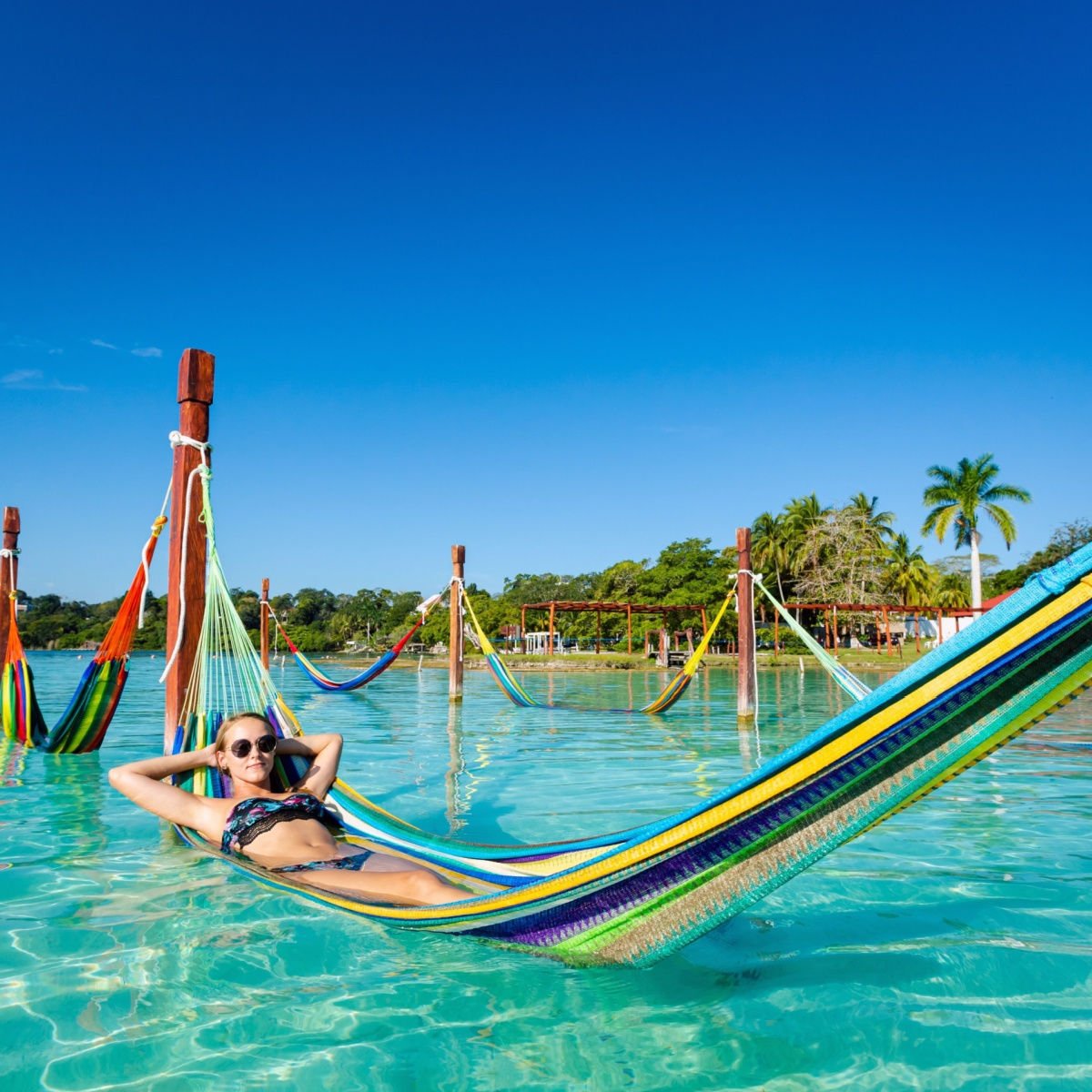Woman relaxing on the lagoon in Bacalar