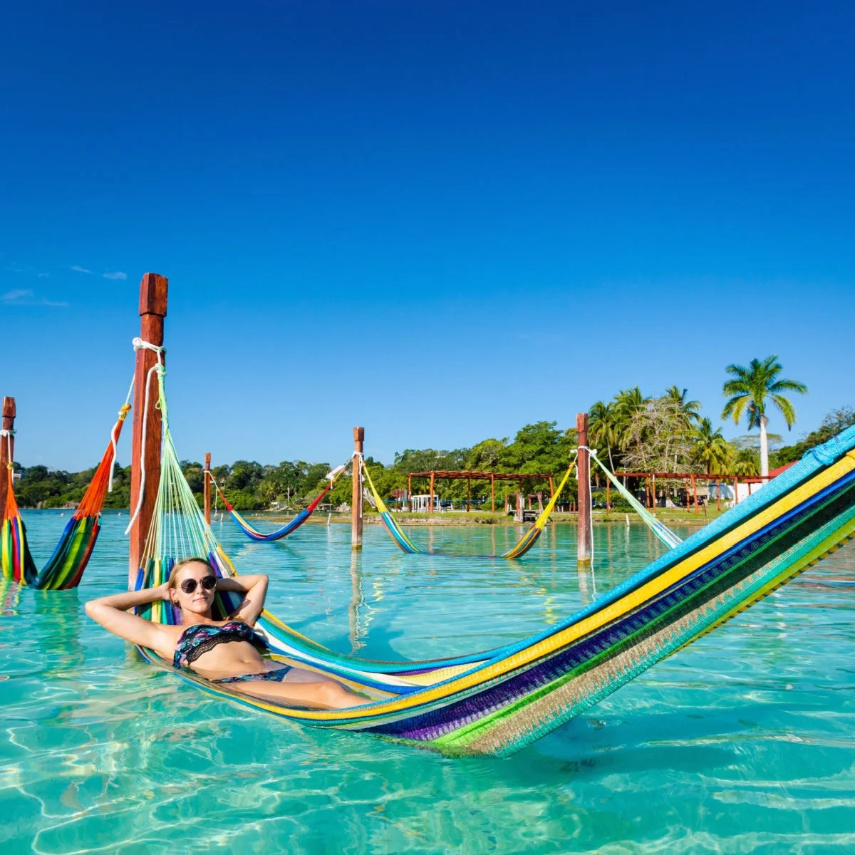 Woman relaxing on the lagoon in Bacalar