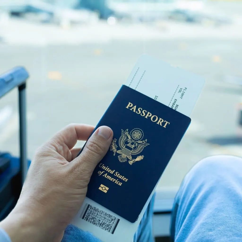A Traveler Holding A U.S. Passport At The Airport